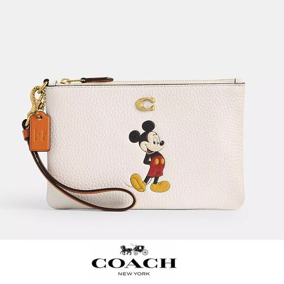 Coach Handbags - ❤️Disney X Coach Essential Wristlet Regenerative Leather With Mickey Mouse